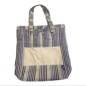 NWOT. Striped Picnic Cooler Tote with plates, cups, and utensils. Multi blu/wht